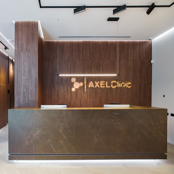 Дизайн рецепшну та кава поінту Axel Clinic
